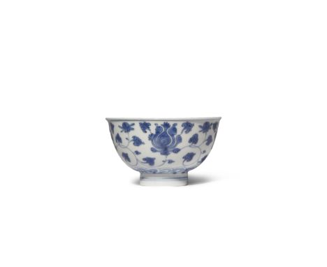 A CHINESE BLUE AND WHITE 'LOTUS' BOWL KANGXI 1662-1722 The U-shaped body with an everted rim and supported on a tall gently f
