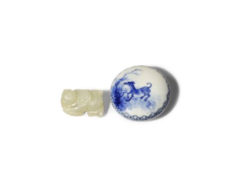 A CHINESE BLUE AND WHITE SEAL PASTE BOX AND COVER AND A JADE CARVING OF A BOY 19TH AND 20TH CENTURY The box cover painted wit