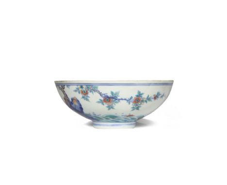 A CHINESE DOUCAI 'MAGNOLIA' BOWL KANGXI 1662-1722 The U-shaped body painted with a blossoming magnolia tree growing from rock