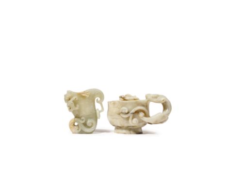 TWO CHINESE JADE LIBATION CUPS MING AND QING DYNASTY The handle of the larger cup formed as a mythical beast, with a further 