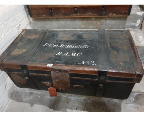 19TH CENTURY LEATHER BOUND MILITARY TRUNK WITH LABELS