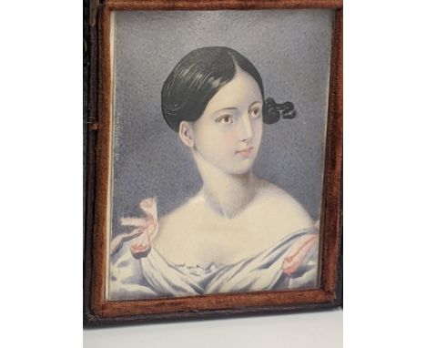 A miniature portrait of a maiden, oil, probably 18th century, cased, H.8.5cm W.6.5cm