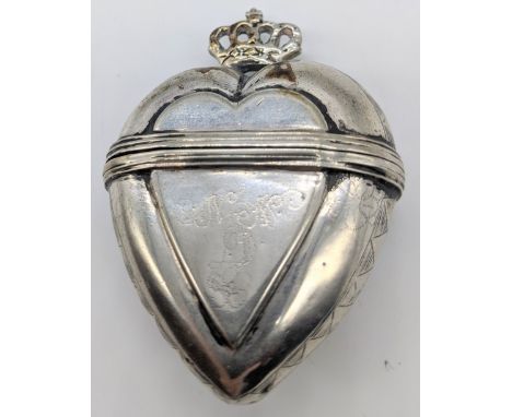 A Continental silver heart box, crown finial, marks to interior lip, 29g, L.6cm