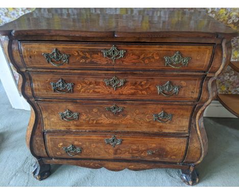An 18th century Dutch floral marquetry inlaid bombe commode/ chest of drawers, four long drawers, inlay to top and side panel