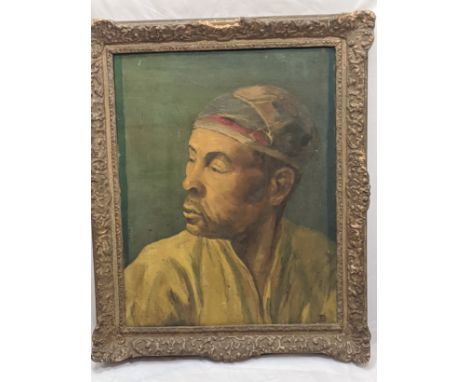 Early 20th century Continental School, portrait of a North African man, oil on canvas, indistinctly monogrammed lower left, H