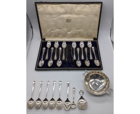 A collection of silver to include a cased set of 12 spoons (tongs not original), 6 teaspoons, a mustard spoon, a caddy spoon 