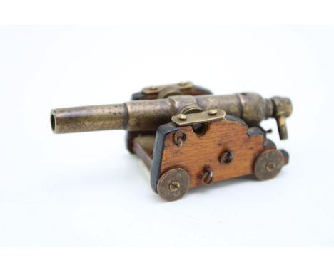 c19th bronze miniature live firing obsolete calibre cannon with wooden carriage c1890  the item is in very good condition wit