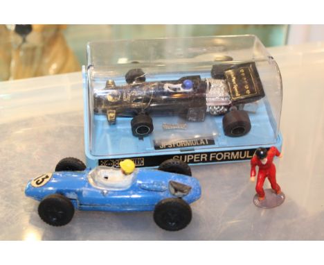 Scalectric Super Formula 1 C.050 John Player Special together with another vintage Tri-ang Scalextric car, reproduction box a