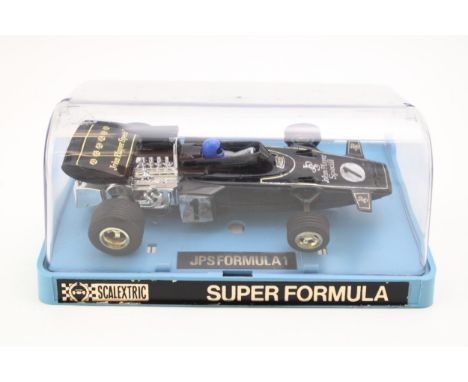 A vintage Boxed Scalextric JPS SUPER FORMULA 1 car. C. 050 Made in Great Britain. c1970s.  In good original condition. Showin