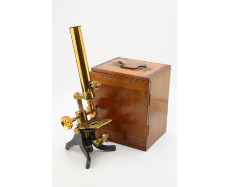 A Quality early c20th brass microscope with mahogany case and various brass accessories  good overall condition