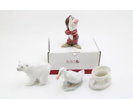 Lladro to include a polar bear, a duck, a two handled vase and a boxed Nao figure of Grumpy (4).  In good condition with no o