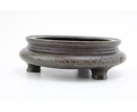 Chinese bronze three-footed censor, Qing Period, 11cm diameter.