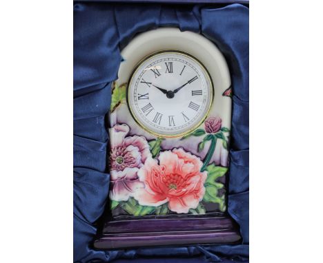 Boxed Old Tupton Ware floral mantle clock, 17cm tall.  In good condition with no obvious damage or restoration.