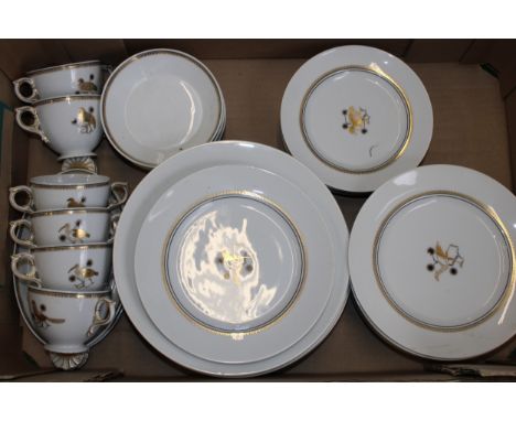 A collection of Royal Copenhagen dinner ware to include plates of varying sizes with some cups, with animal motifs to centre 