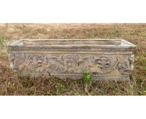 Composite stone decolrated rectangular garden planter - width 72 cm .    Weathered. Some minor losses. 