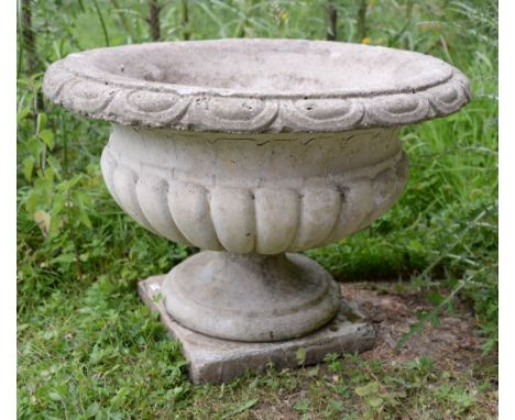 Composite stone garden planter on square foot - diameter 64 cm .    Weathering , some minor losses