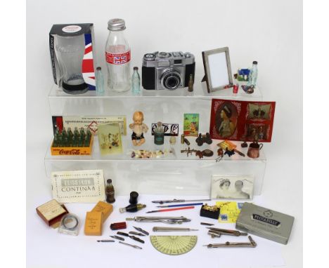 A mixed lot of collectibles to include a Zeiss Ikon camera, Coca Cola and other miniatures etc.
