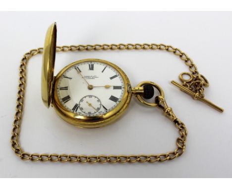 Russells Ltd; an 18ct gold full hunter pocket watch, the enamel dial set with Roman numerals and subsidiary seconds dial, dia