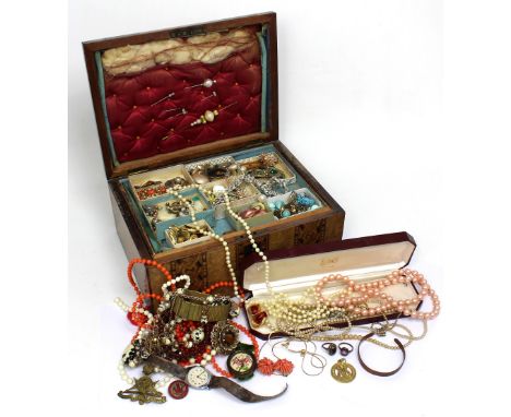 A late 19th/early 20th century walnut inlaid jewellery box containing a quantity of vintage costume jewellery to include broo