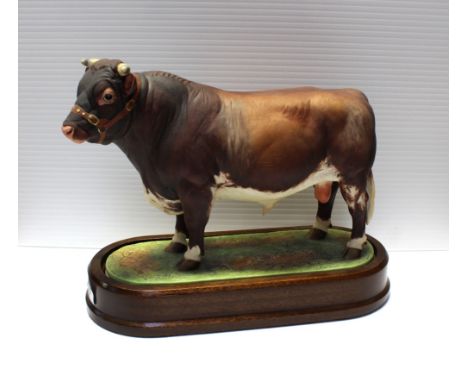 Royal Worcester; a figure of a 'Dairy Short Horn Bull' modelled by Doris Lindner 1965, on fitted wooden plinth, limited editi