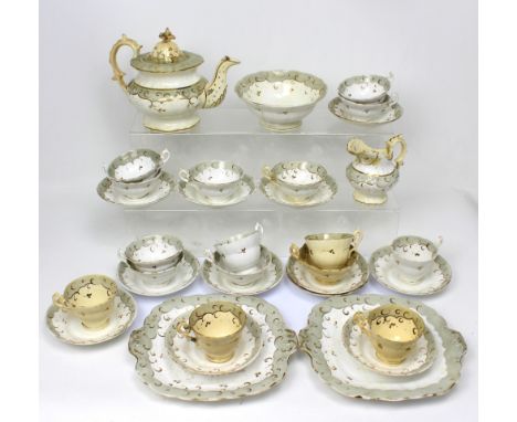 An early 19th century Rockingham-style part tea service to include teapot, plates sucrier etc (some af).