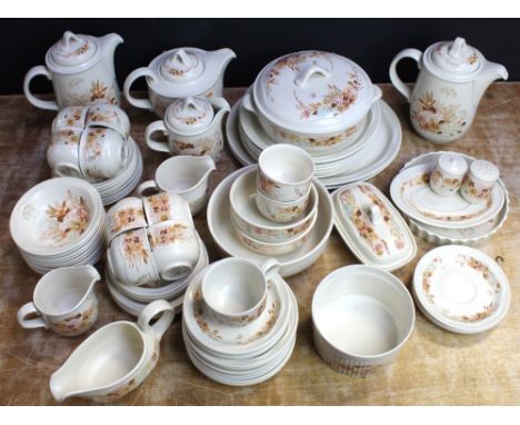 A large quantity of Poole 'Summer Glory' dinner and teaware to include teapot, two coffee pots, sauce boat, plates, side plat