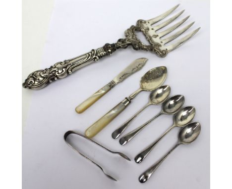 Four hallmarked silver teaspoons, a pair of hallmarked silver sugar tongs, a silver butter knife with mother of pearl handle 