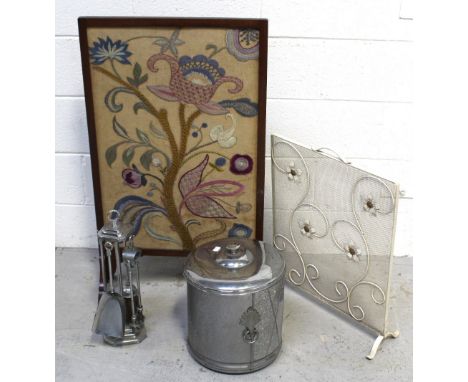 An early 20th century mahogany-framed wool embroidered fire screen, a small retro metal floral decorated fire screen, a coal 
