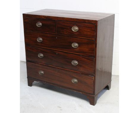 A late 19th/early 20th century mahogany two-over-three chest of drawers with string inlay to the top, on bracket supports, 10
