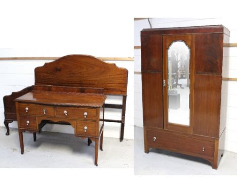 An early 20th century mahogany single mirror door wardrobe with arched top, bevelled mirror over one long lower drawer to cur