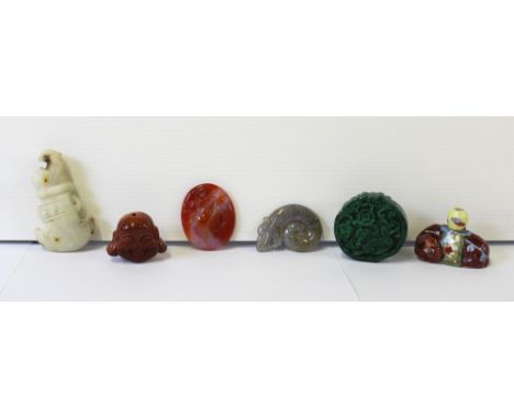 A quantity of carved Oriental figures and tokens to include jade (6).