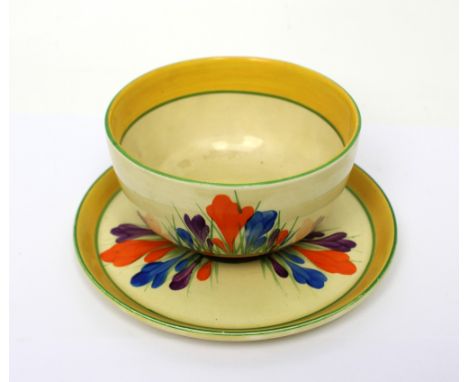 A Clarice Cliff Bizarre 'Crocus' sugar bowl, diameter 11cm and matching plate, diameter 15.5cm (2). CONDITION REPORT Age-rela