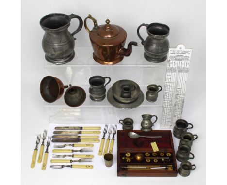 A collection of pewter alcohol measures, two copper funnels, a copper teapot, a boxed set of weights, a thermometer stamped f