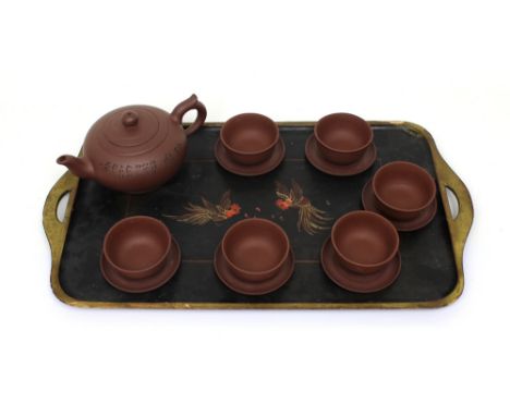 A Chinese Yixing tea service comprising teapot, six bowls and saucers and a lacquered tray decorated with cockerels. CONDITIO