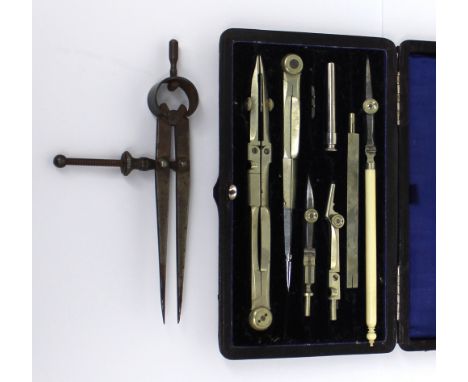A leather-cased set of drawing instruments by Reeves & Sons Ltd and a Moore & Wright compass.