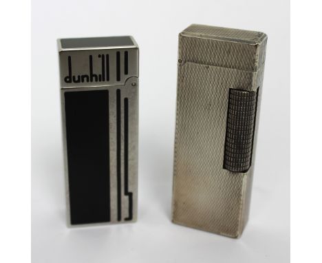 A boxed Dunhill-style enamelled lighter, model no.21135, retaining guarantee certificate and a further boxed Dunhill 'Rollaga