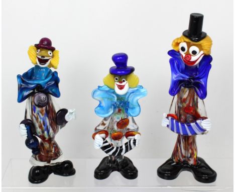 Three Murano glass clowns; two playing musical instruments and one carrying a bottle, height of largest 31cm (3). CONDITION R