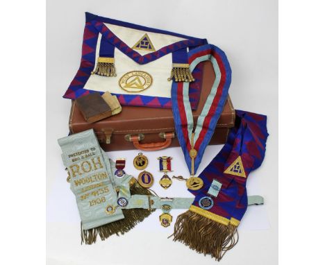 A quantity of Masonic regalia to include apron, sash, various books, two hallmarked silver jewels for The West Lancashire Lod