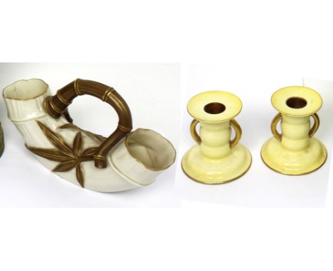 A pair of Carlton ware yellow and gilt-heightened candlesticks, numbered to base N20/N2174158, height 8cm, a Royal Worcester 