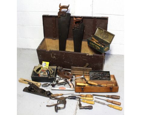A vintage wooden toolbox with a quantity of vintage tools to include planes, saws, drills, drill bits etc, also a small woode