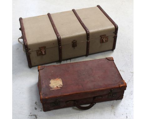 A vintage leather suitcase and travelling trunk (2).