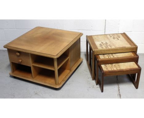 A modern square coffee table with shelves, drawers and cupboard, 46.5 x 76.5cm and a nest of three tile-topped tables (2).