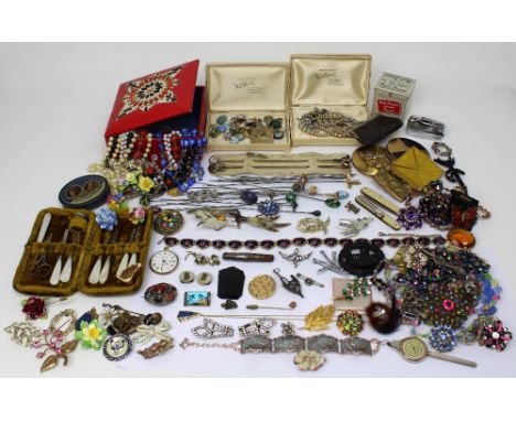 A large quantity of mainly vintage costume jewellery to include earrings, necklaces, brooches etc.