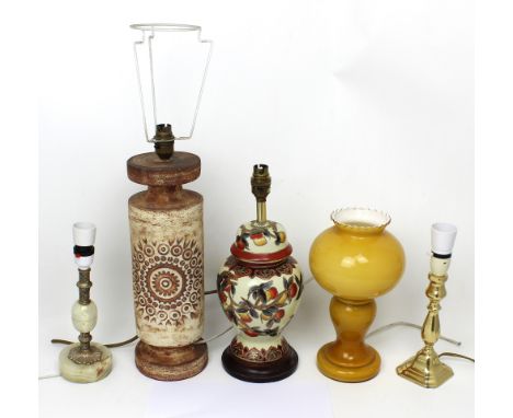 Five table lamps to include an onyx example, a brass example, one in the form of a yellow ceramic oil lamp, an Oriental balus