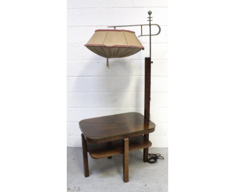 A c1920s Art Deco mahogany marquetry inlaid table with lower shelf with integral wood and metal standard lamp, with original 