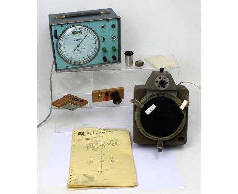 A Griffin Centisecond Timer with instructions.