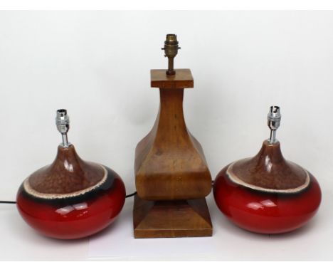 A pair of contemporary ovoid table lamps and a large treen Oriental-style table lamp (3).