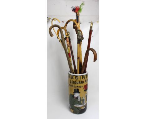 A modern ceramic stick/umbrella stand with printed French advertising decoration, height 45cm, also including a number of wal