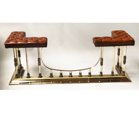 ROBIN GAGE CLUB FENDER, 20th century tan leather deep button upholstered seat pads raised upon shaped brass balustrade, (stam