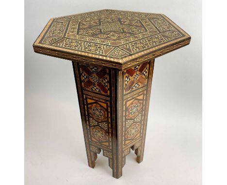 DAMASCUS LAMP TABLE, the parquetry hexagonal top above a mihrab design base, 32cm x 32cm x 49cm H.